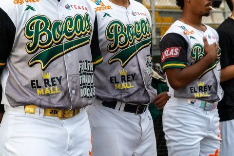 Close-up of Bocas baseball players in their team jerseys